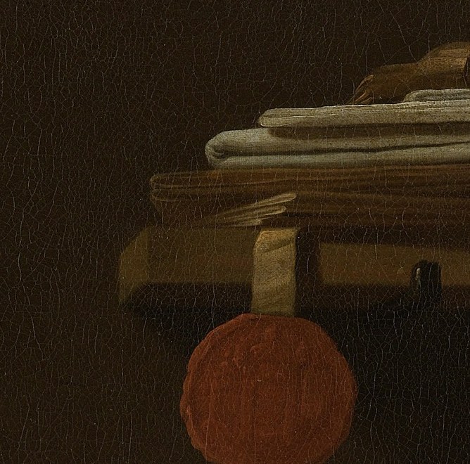 A red coral sphere. In emblem books, coral wards off death.