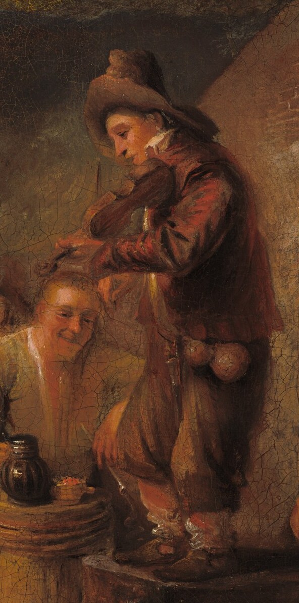 A musician plays, entertaining the patrons.