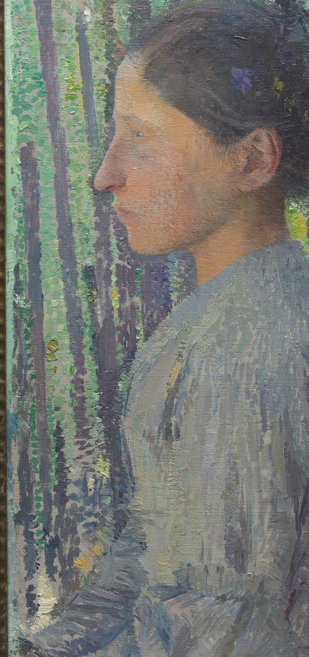 Here, a woman turns away, lost in thought.