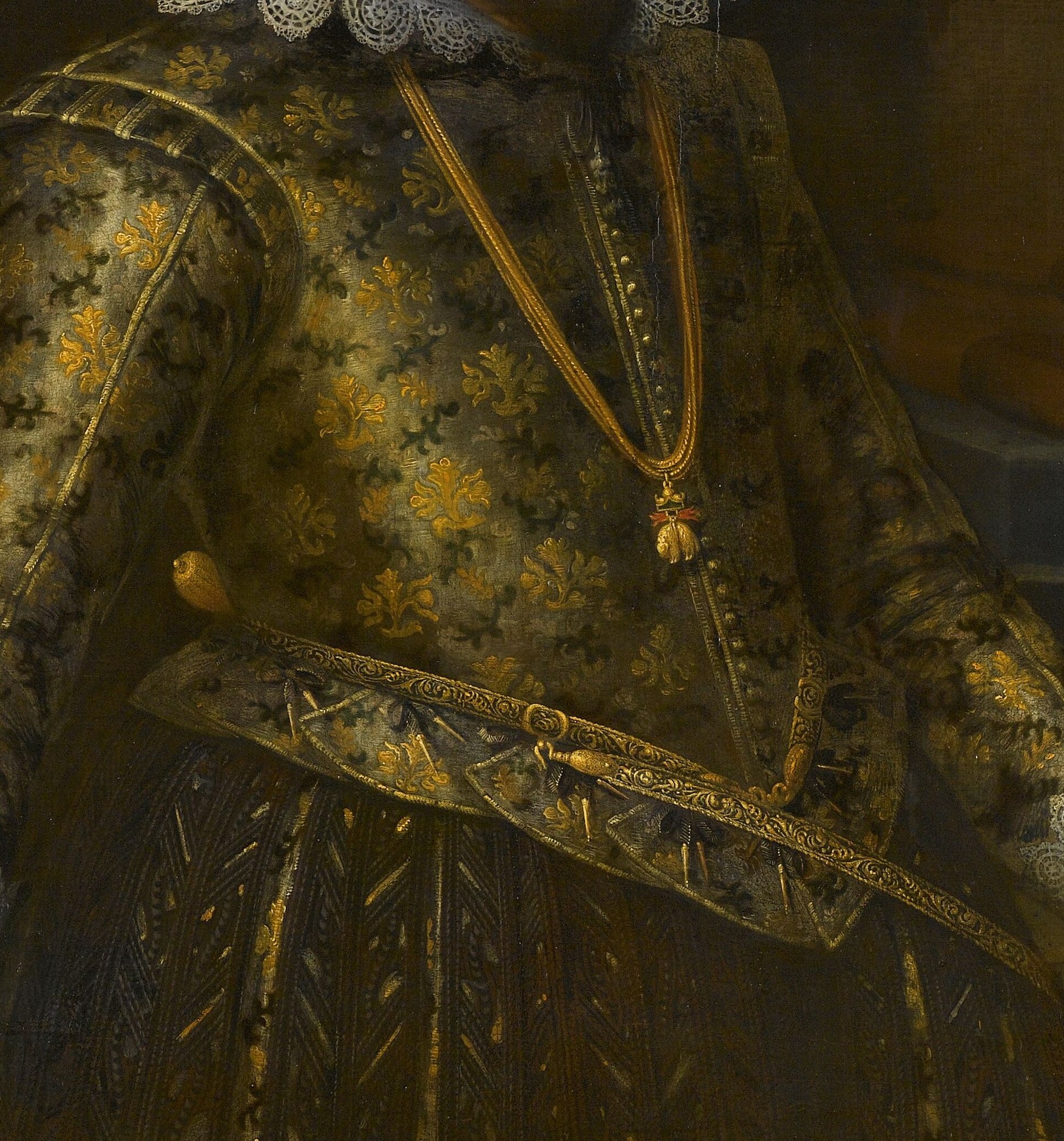 The shimmering gold embroidery on the dark fabric suggests opulence and the sitter's high social standing.