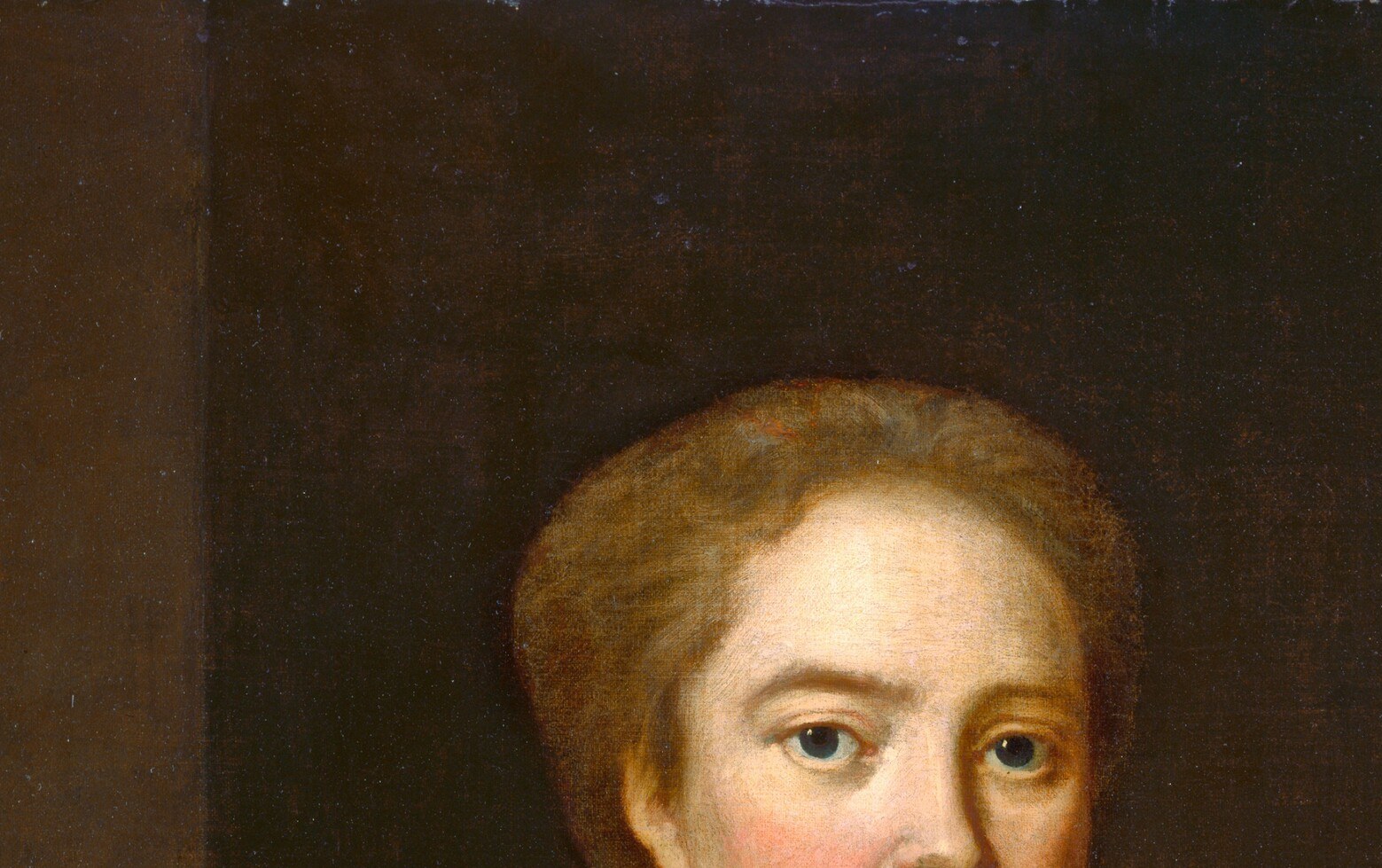 Her loosely pinned auburn hair was the height of fashion.