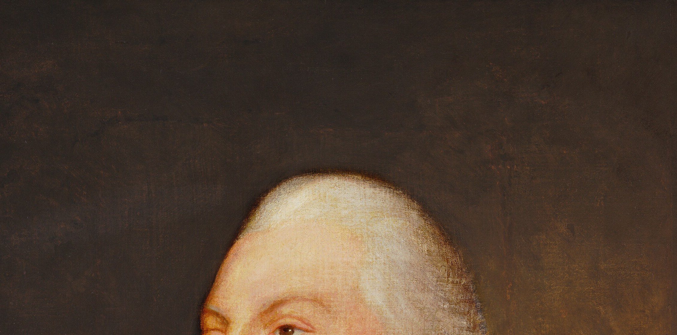 The pristine white wig signals rank and era, placing this firmly in late 18th-century military culture; its soft contours contrast with the dark uniform below.