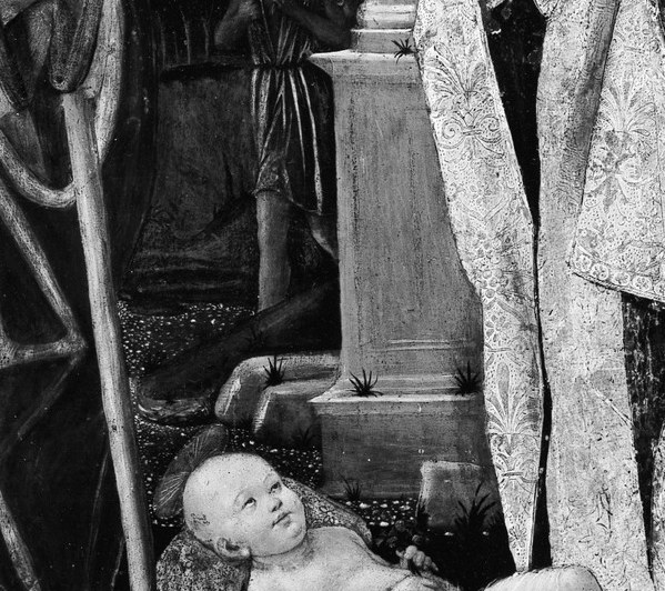 Now find the quiet center. The child rests on bare earth.