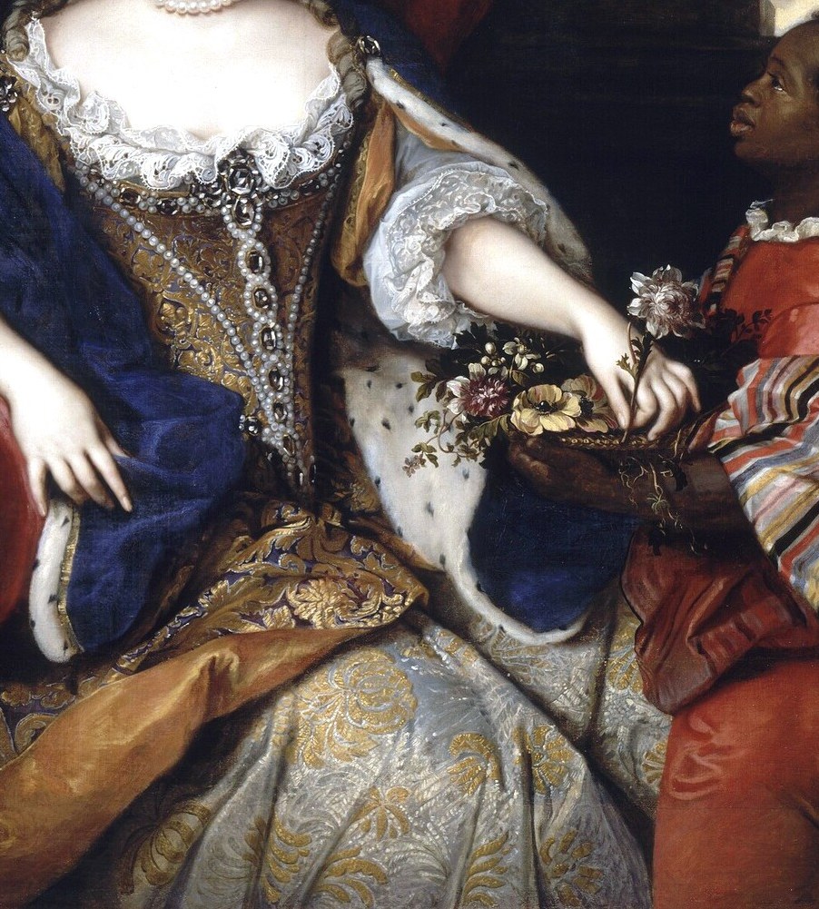 The opulent fabric, rich embroidery, and fur trim showcase the wealth and status of the sitter.