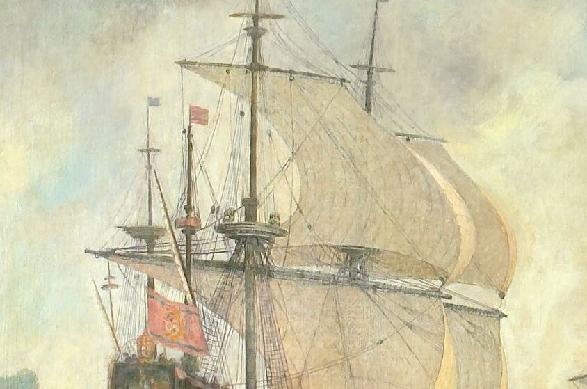 The wind-filled sails suggest movement and the vastness of the sea, highlighting the maritime setting.