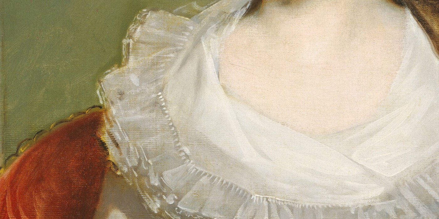 A blue sash cinched just below the bust marks the Empire silhouette.