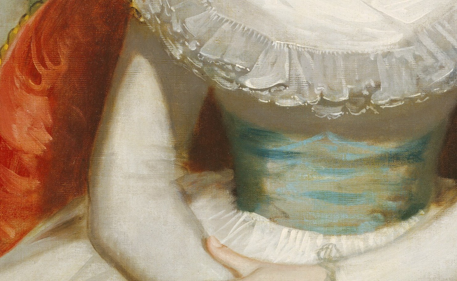 Her hands rest in her lap like a lesson learned.