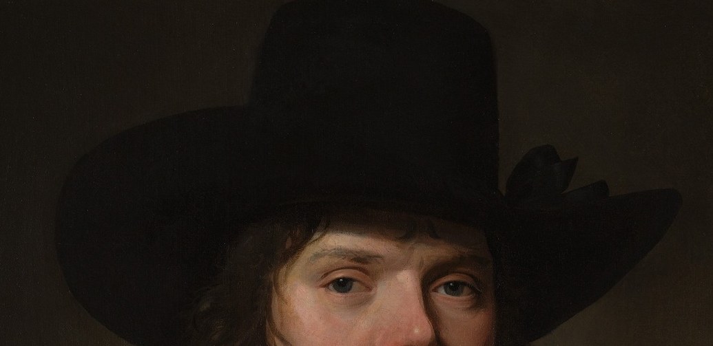 His broad hat and dark coat were the height of fashion.