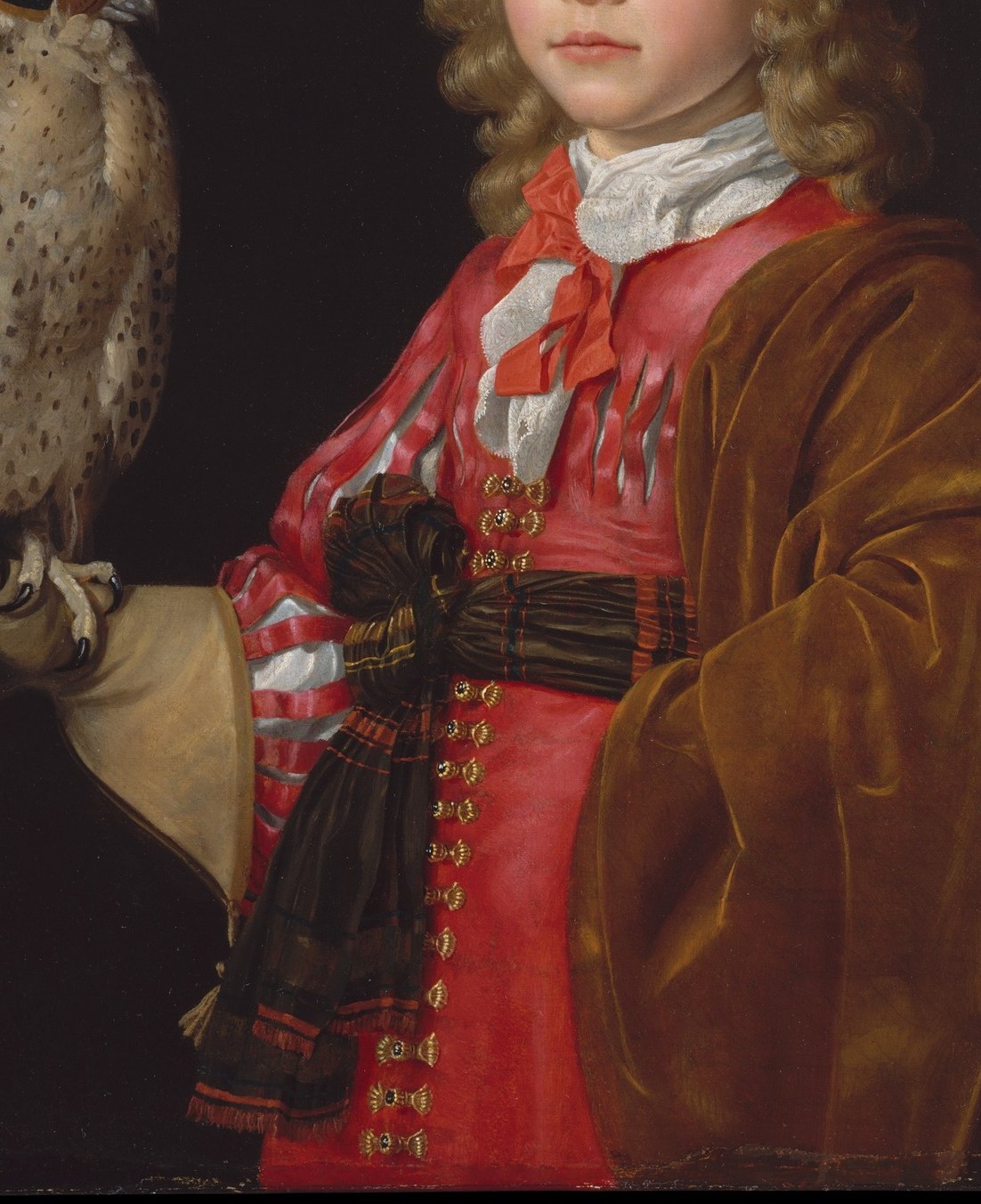 The densely worked red-and-gold surface demonstrates Vaillant's ability to render luxury textiles; the costume's cost signals the family's wealth as explicitly as any coat of arms.