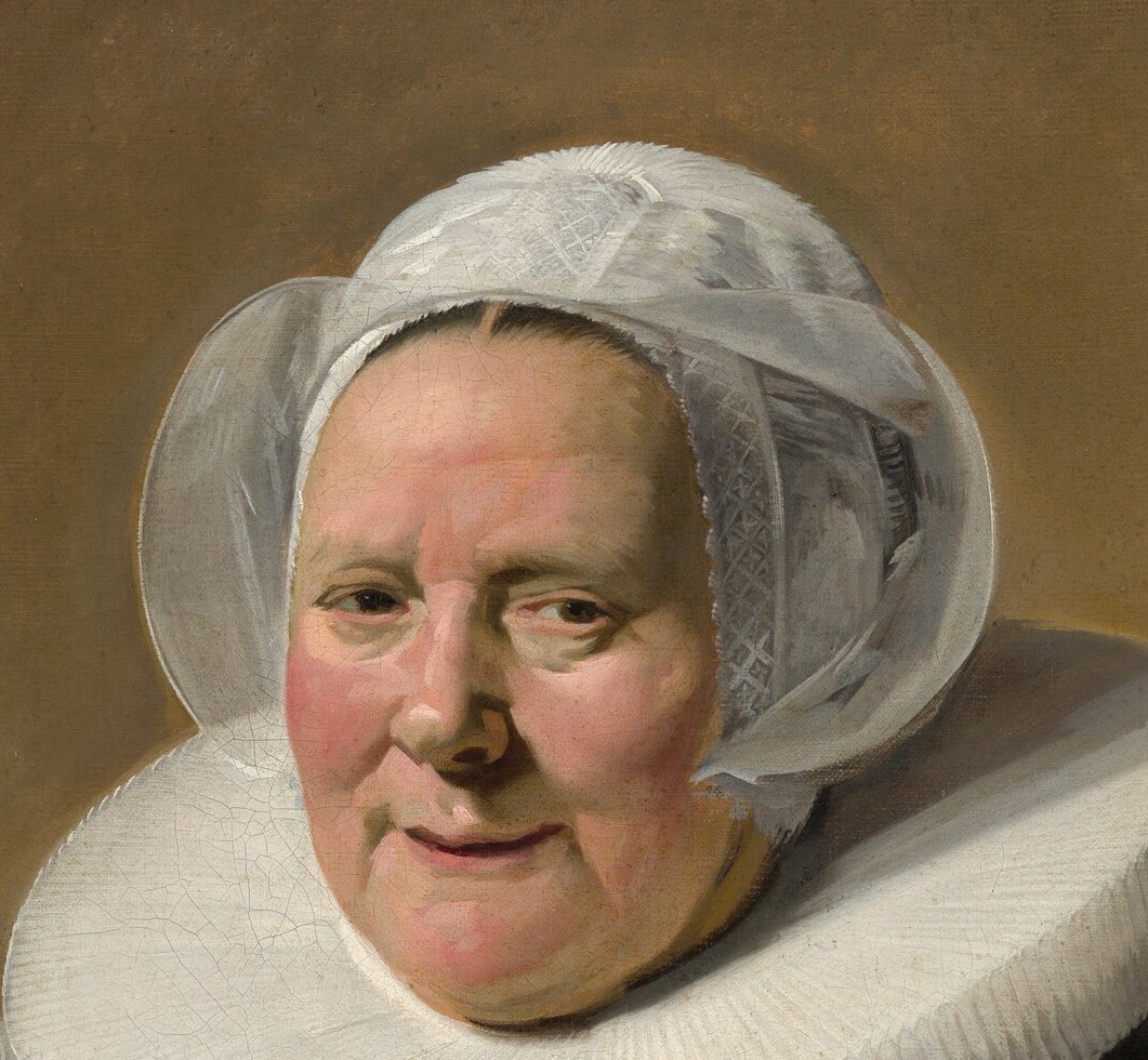 See the delicate lace of her cap, rendered with quick brushstrokes.