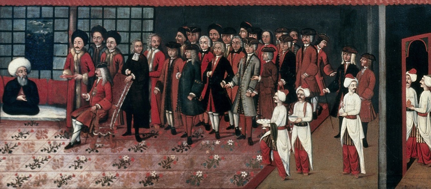 Notice the mix of European and local dress.