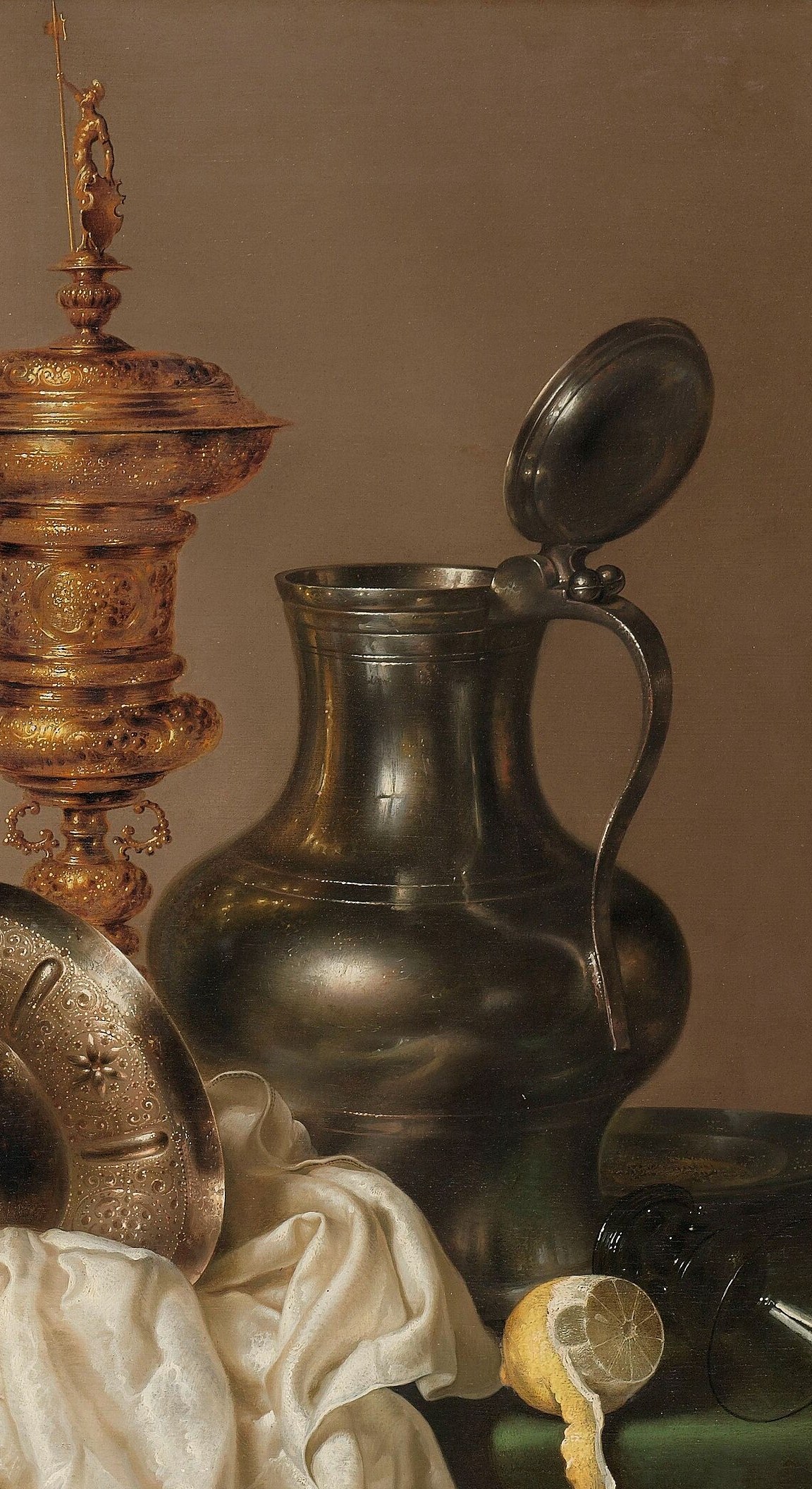 Now look inside the pewter jug's polished belly.