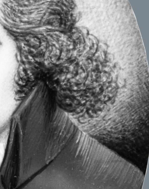 The dangling curl beside his face was called a 'lovelock'.