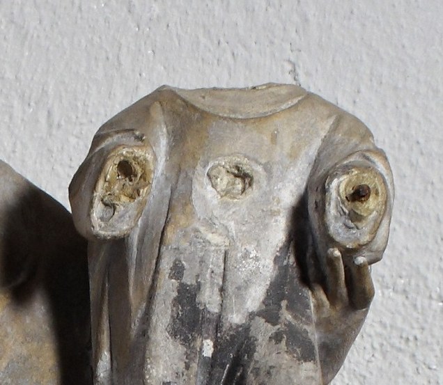 The mother's head is completely missing.