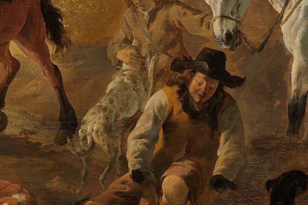 A man kneels to his dog. The hunt rests.