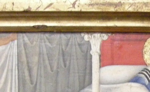 Look closely above the headboard.