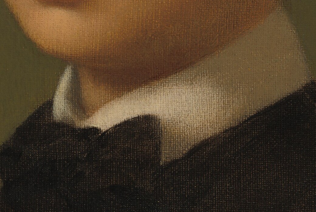 So he sat his younger brother René down in a dark jacket and a stiff white collar.