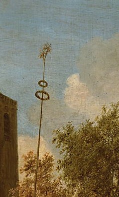 A prominent architectural feature anchoring the village scene, suggesting a place of worship and community gathering.