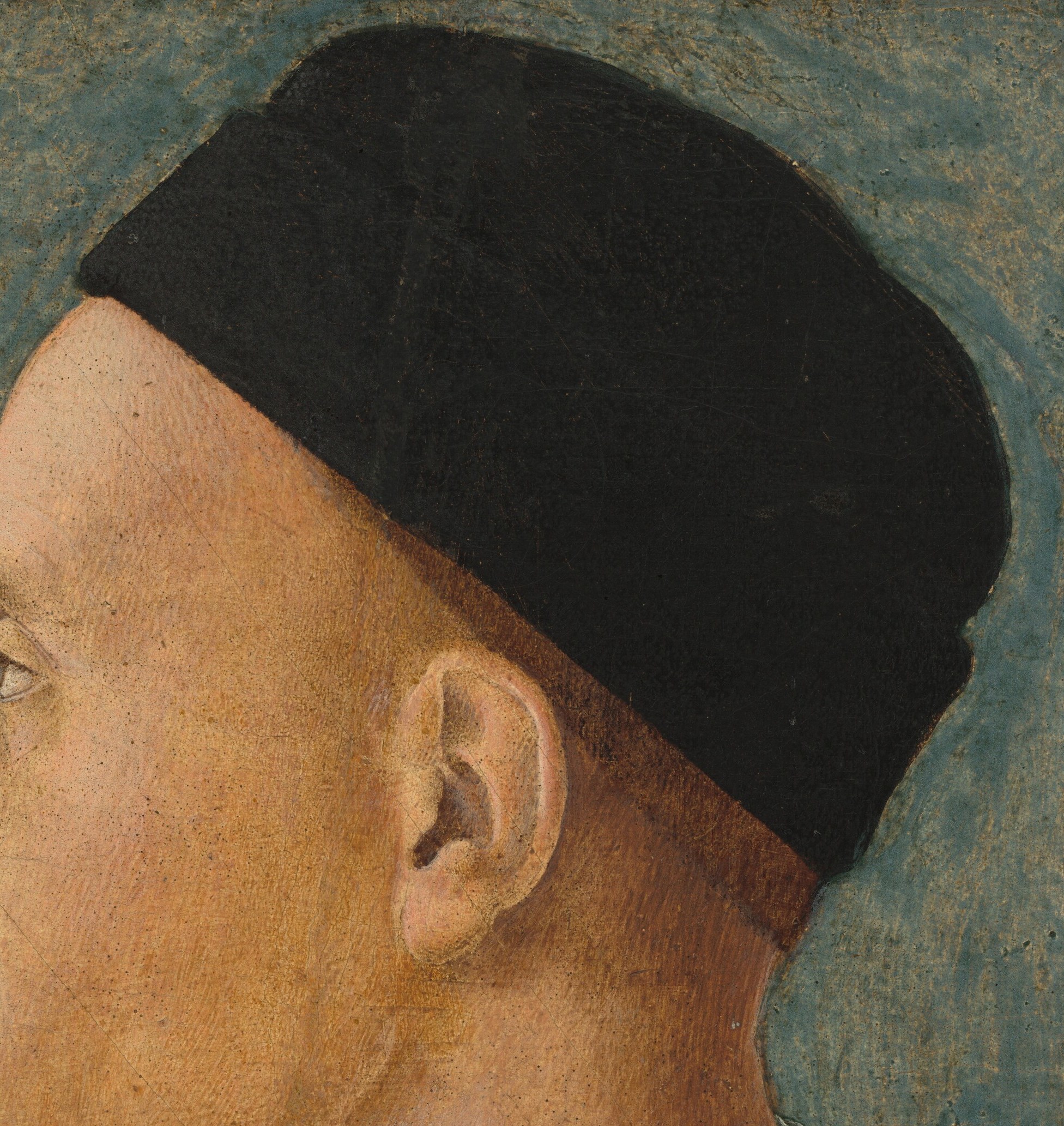 His precise black cap shows a nobleman's status.
