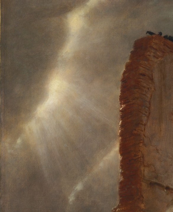 Sunlight breaks through the dark clouds.