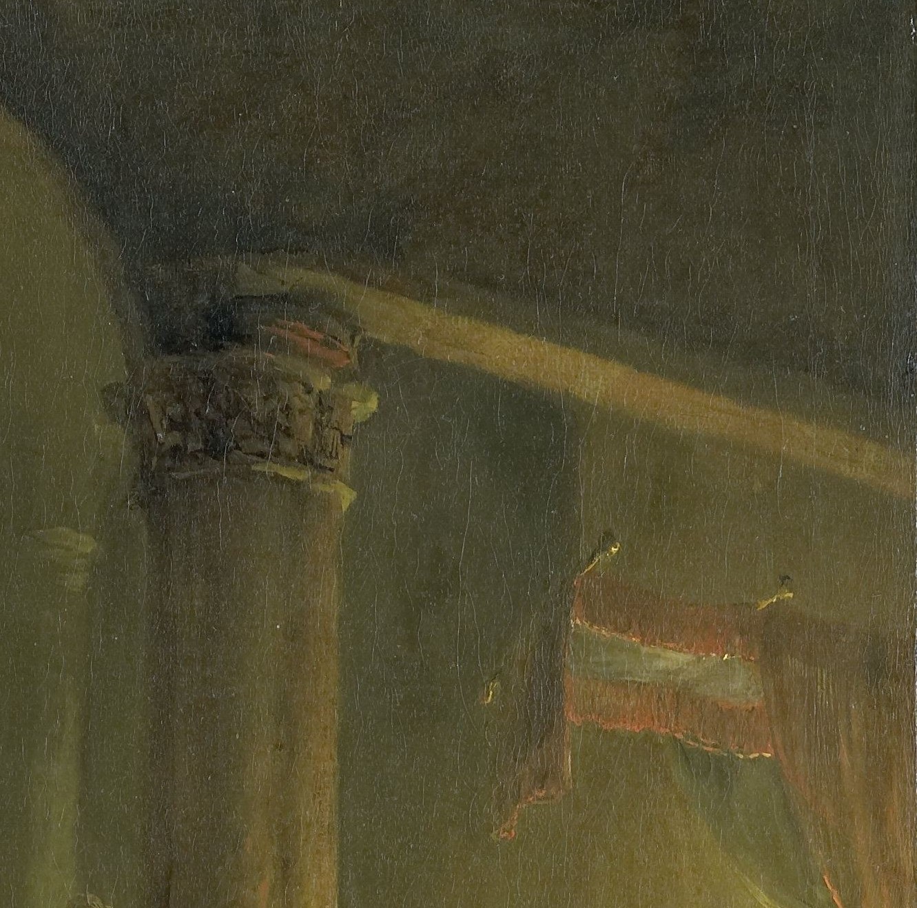 A shaft of light cuts the dark.