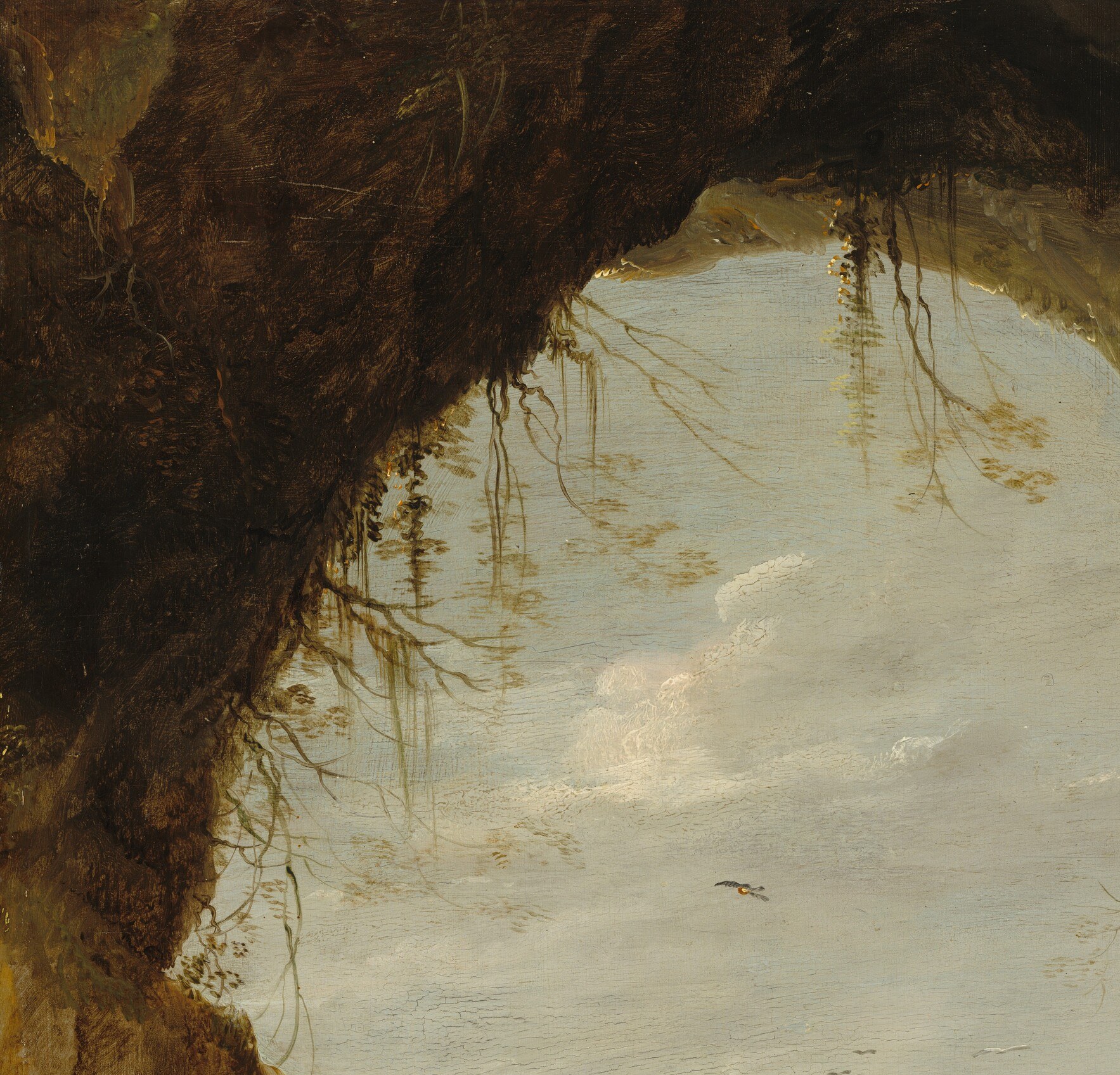 A grotto frames an expansive landscape beyond.