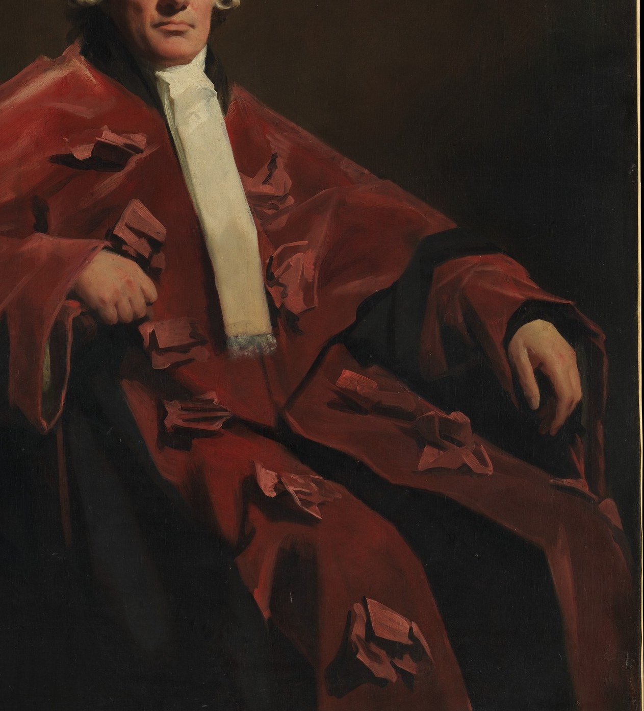 His red robe speaks to high status, probably judicial.