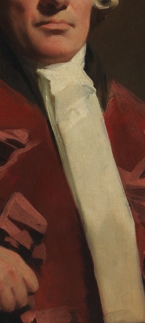The crisp white fabric contrasts with the dark background and red robe, drawing attention to his neck and face.