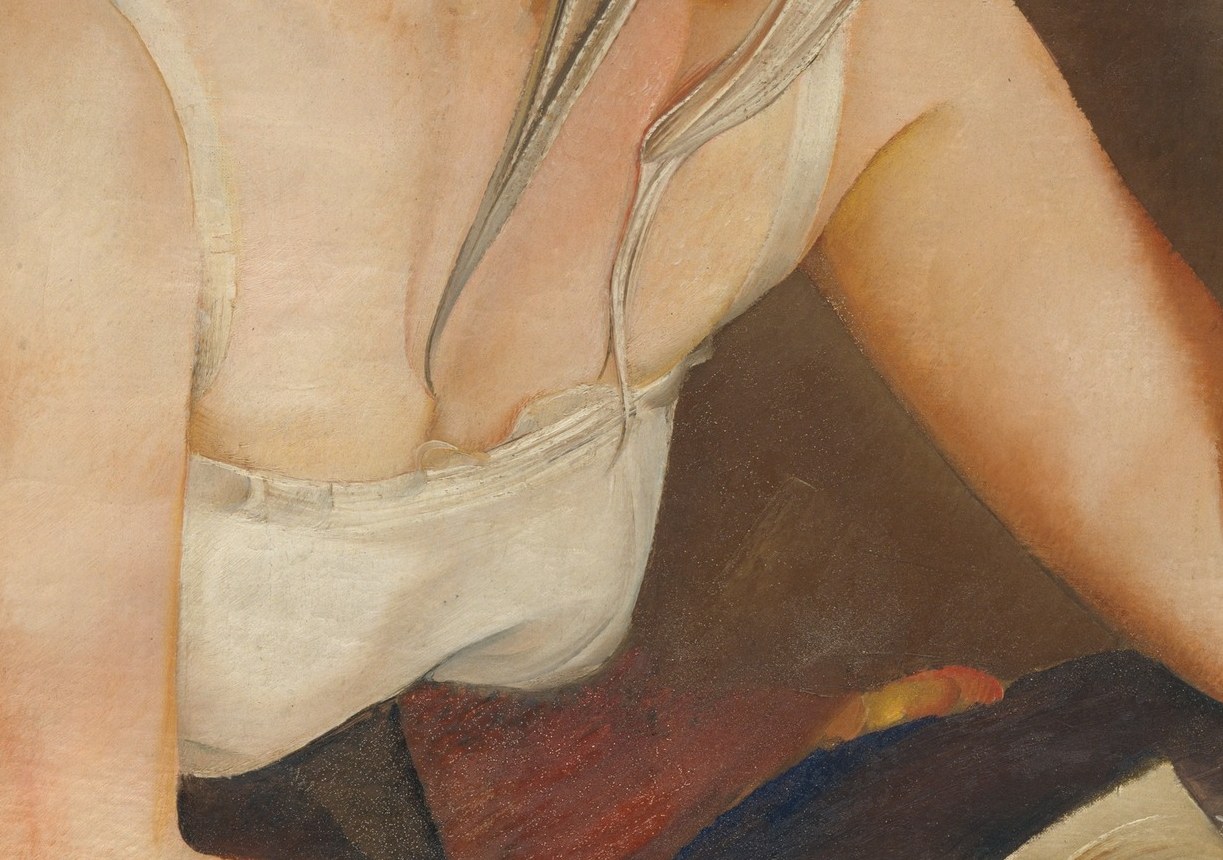 Her loose white garment and hat suggest simple, private attire.