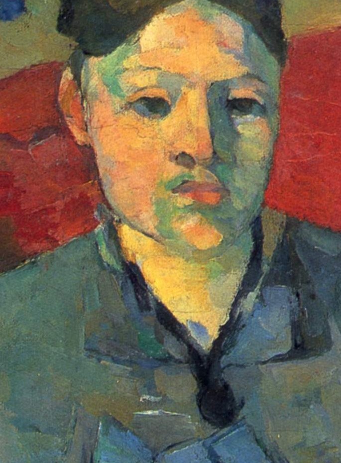 Her gaze is direct yet somewhat distant, conveying a sense of introspection or perhaps resignation.