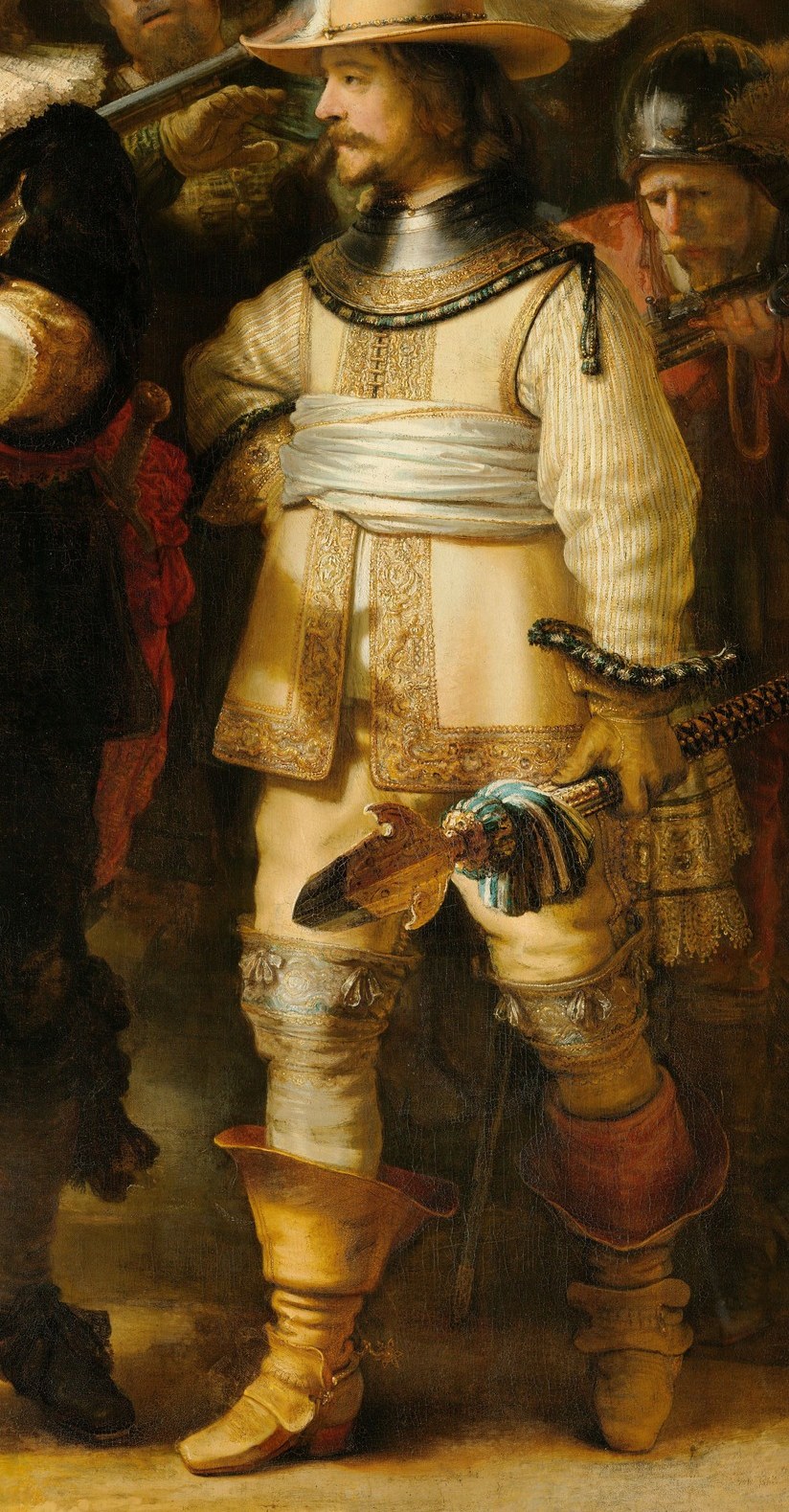 To his right, his lieutenant steps forward in bright yellow.