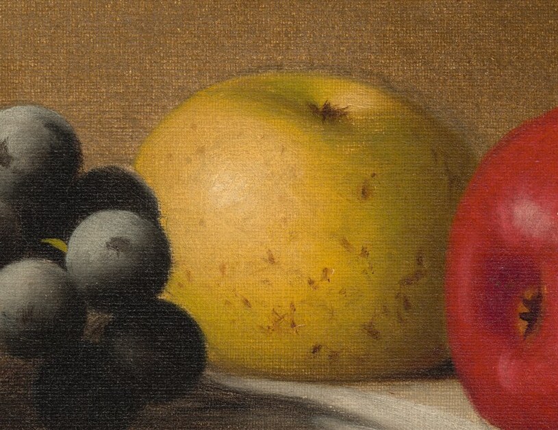 The subtle mottling and warm hue of this apple suggest a different variety and add visual interest.