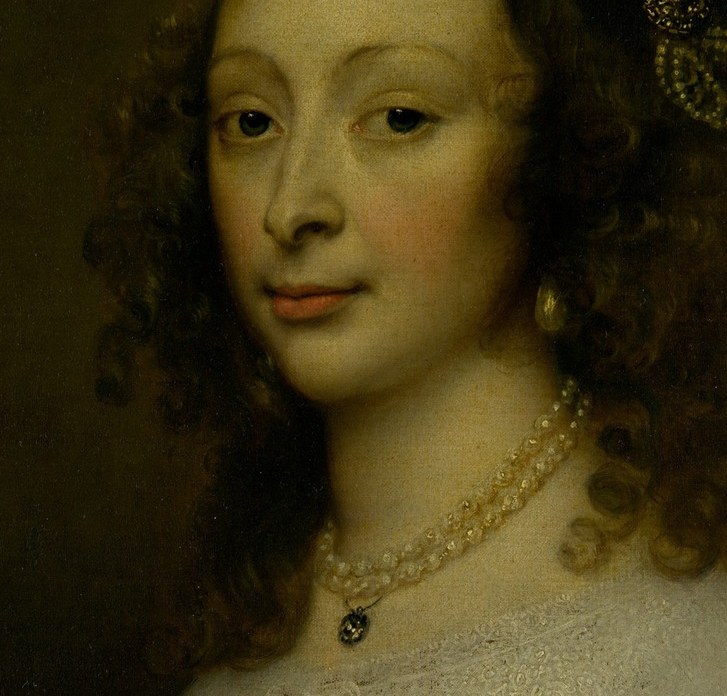 Her face emerges from deep shadow, lit by the artist.