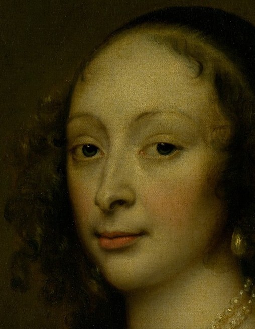 These objects identify her as a woman of means and standing.