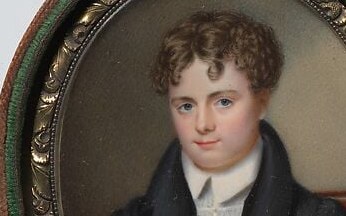 His direct gaze and slightly flushed cheeks create an engaging and lifelike presence.