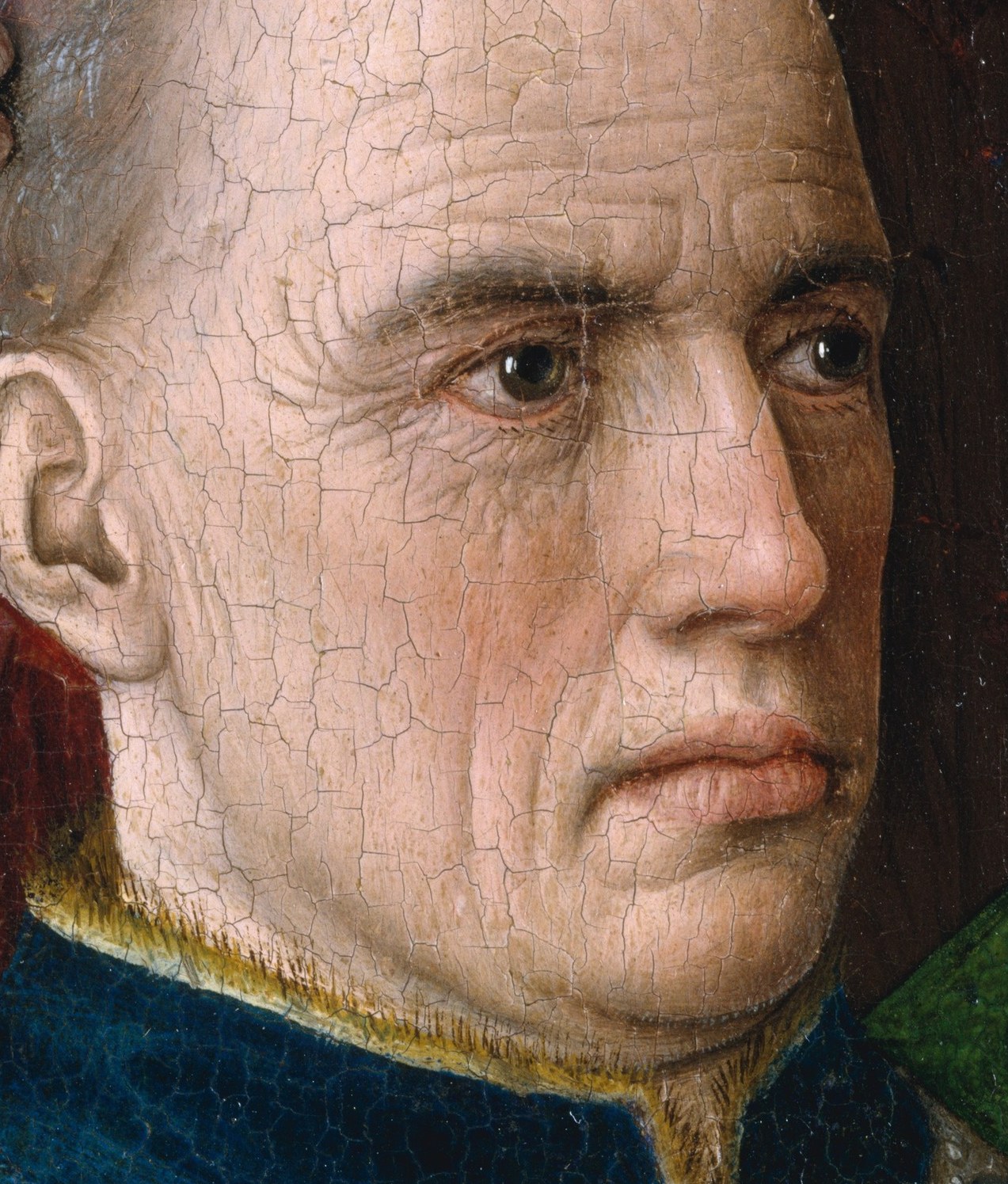 The network of fine wrinkles suggests age and experience, conveying a sense of realism and introspection.