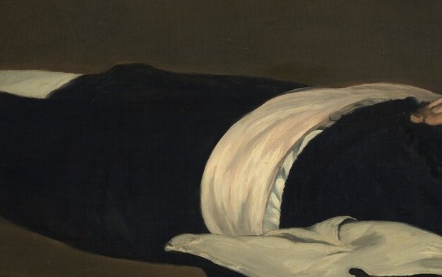 The luminous white break in the otherwise unrelieved black costume pulls the eye to the midsection , exactly where a bull's horn would enter; the wound is implied, never shown