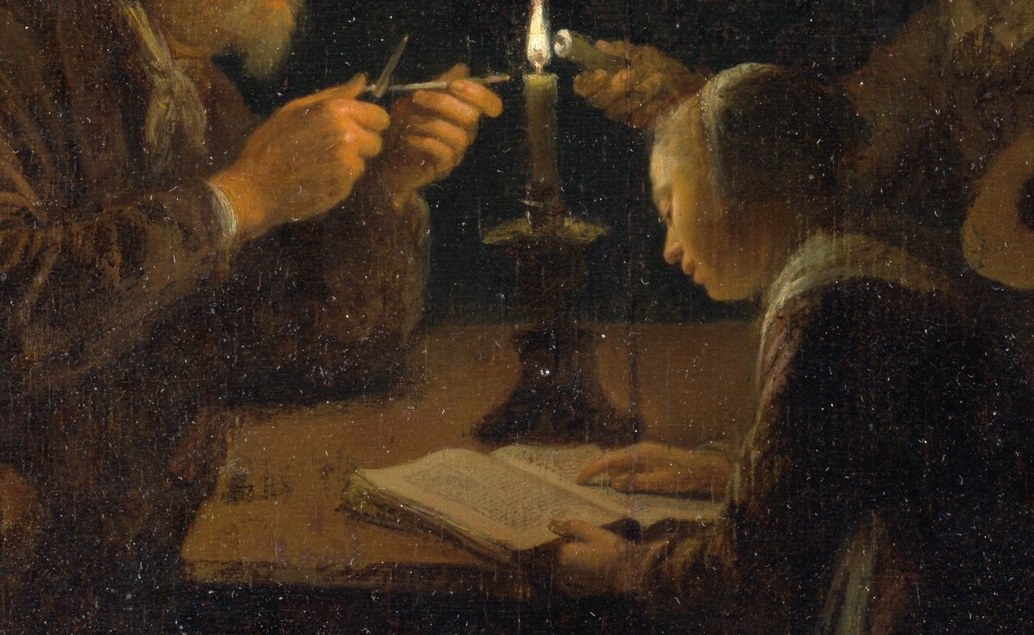 The central prop that justifies the scene's title; the lit pages glow against the dark table, and any visible text or illumination would repay zooming in