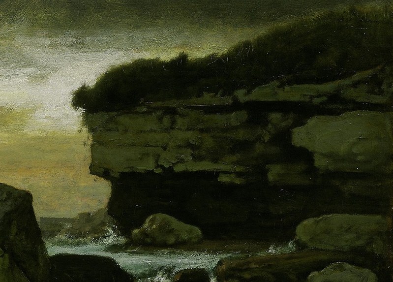 Adds depth to the scene and suggests a vast, rugged coastline.