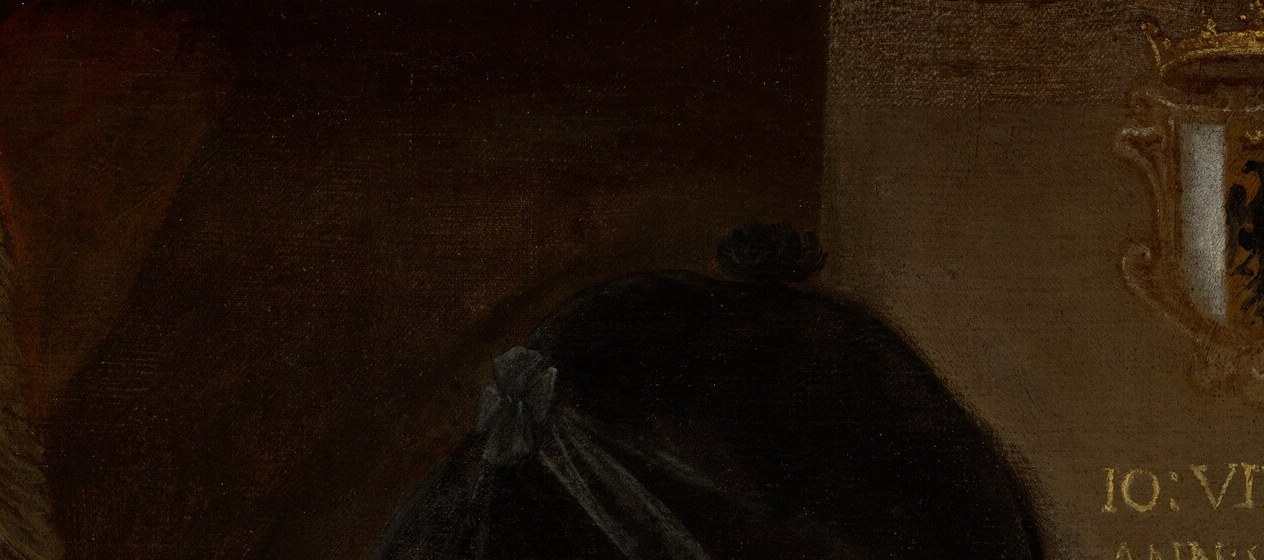 The cap's color unifies hat, doublet and background, making the white ruff and face float , a deliberate compositional device