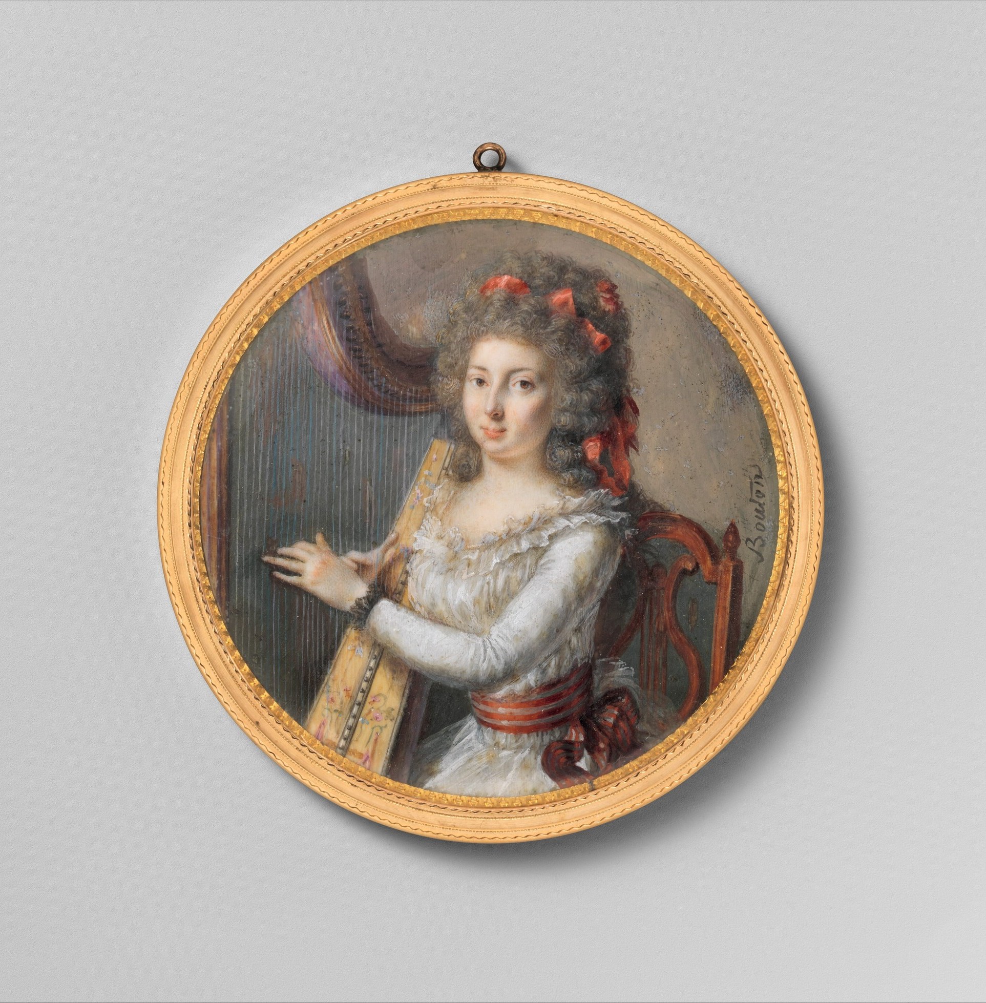 The engine-turned or reeded gold bezel is itself a luxury object; its diameter dwarfs the painted ivory disc, underscoring that the miniature was a precious possession meant to be worn or displayed.