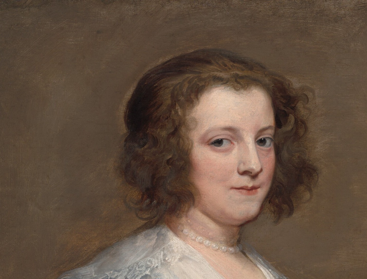 An unknown woman. She meets your eye and will not look away.