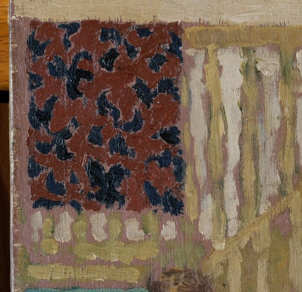 The patterned wall hanging overwhelmed the figure.