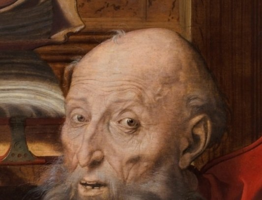 His wide eyes see a divine truth.