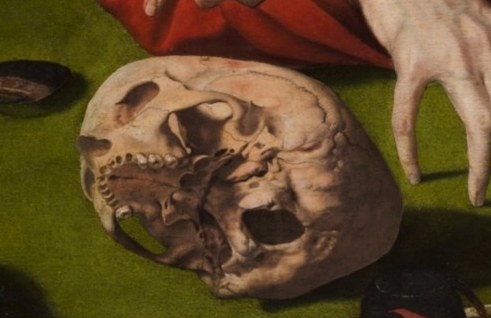 A skull reminds us of earthly vanity.