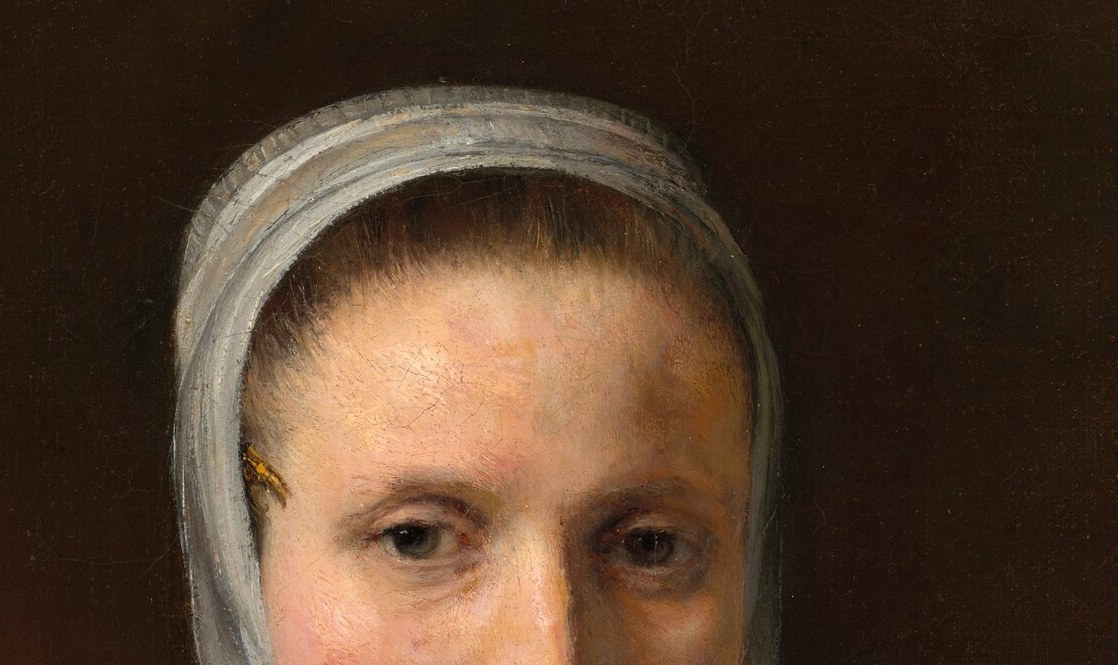 She meets your eyes and does not look away.