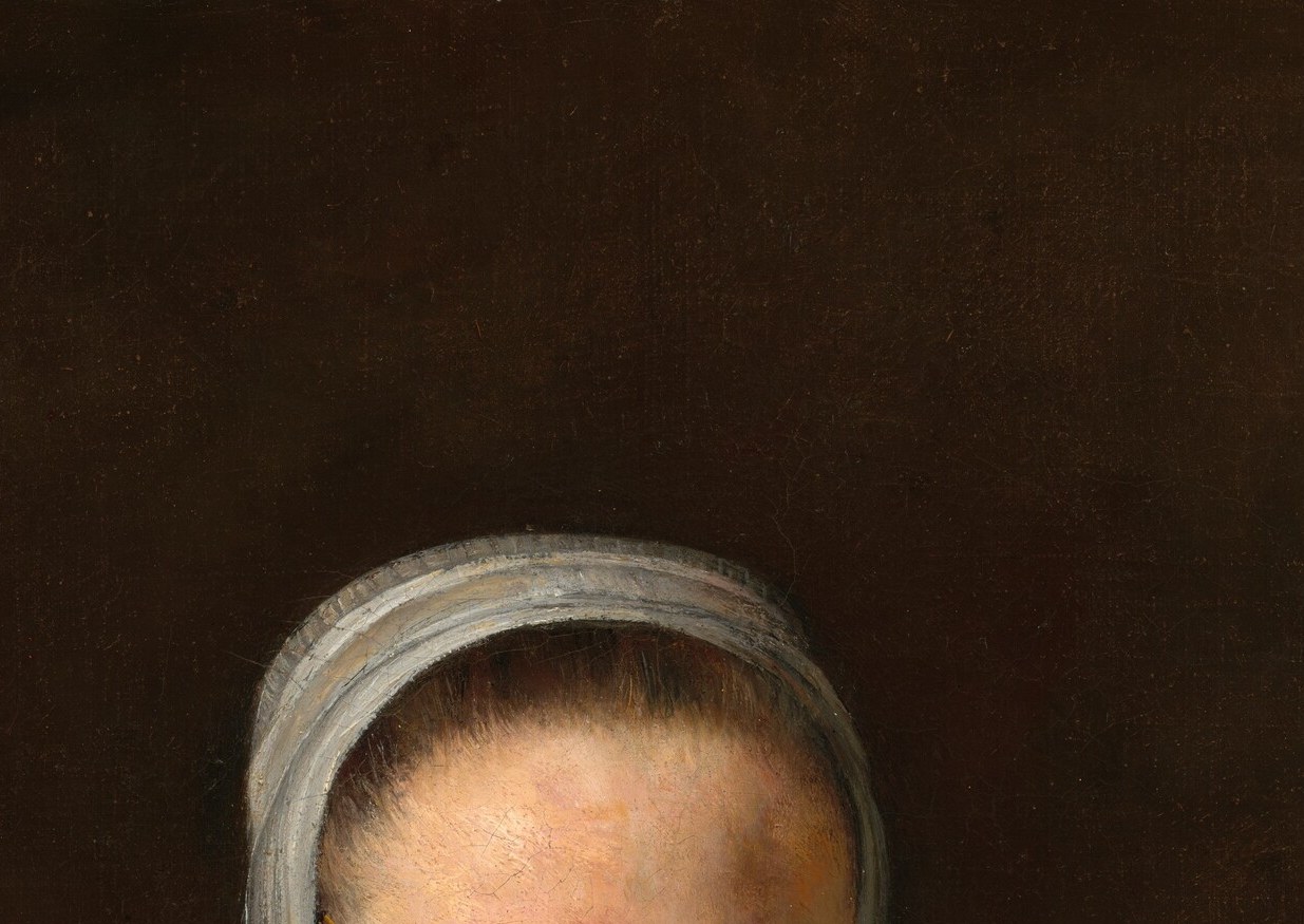 Her white linen marks her as a respectable woman of the Dutch Reformed Church.