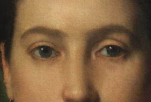 The subtle rendering of her eyes conveys a sense of introspection and calm.