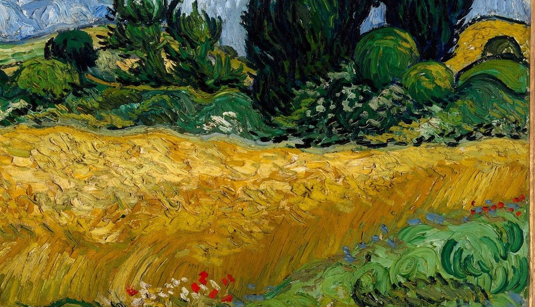 Wind leans the wheat and swirls the clouds with the same rhythm.