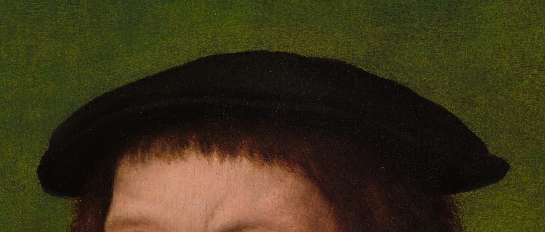 the fashionable black beret signals the sitter's membership in the educated or merchant class